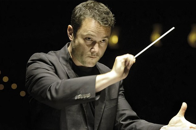 Violinist saves priceless million-pound instrument after dramatic stage fall